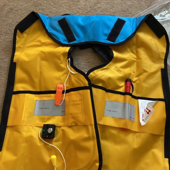 Life jacket. Never worn. New with tags. Manual inflatable jacket - Picture 7 of 13